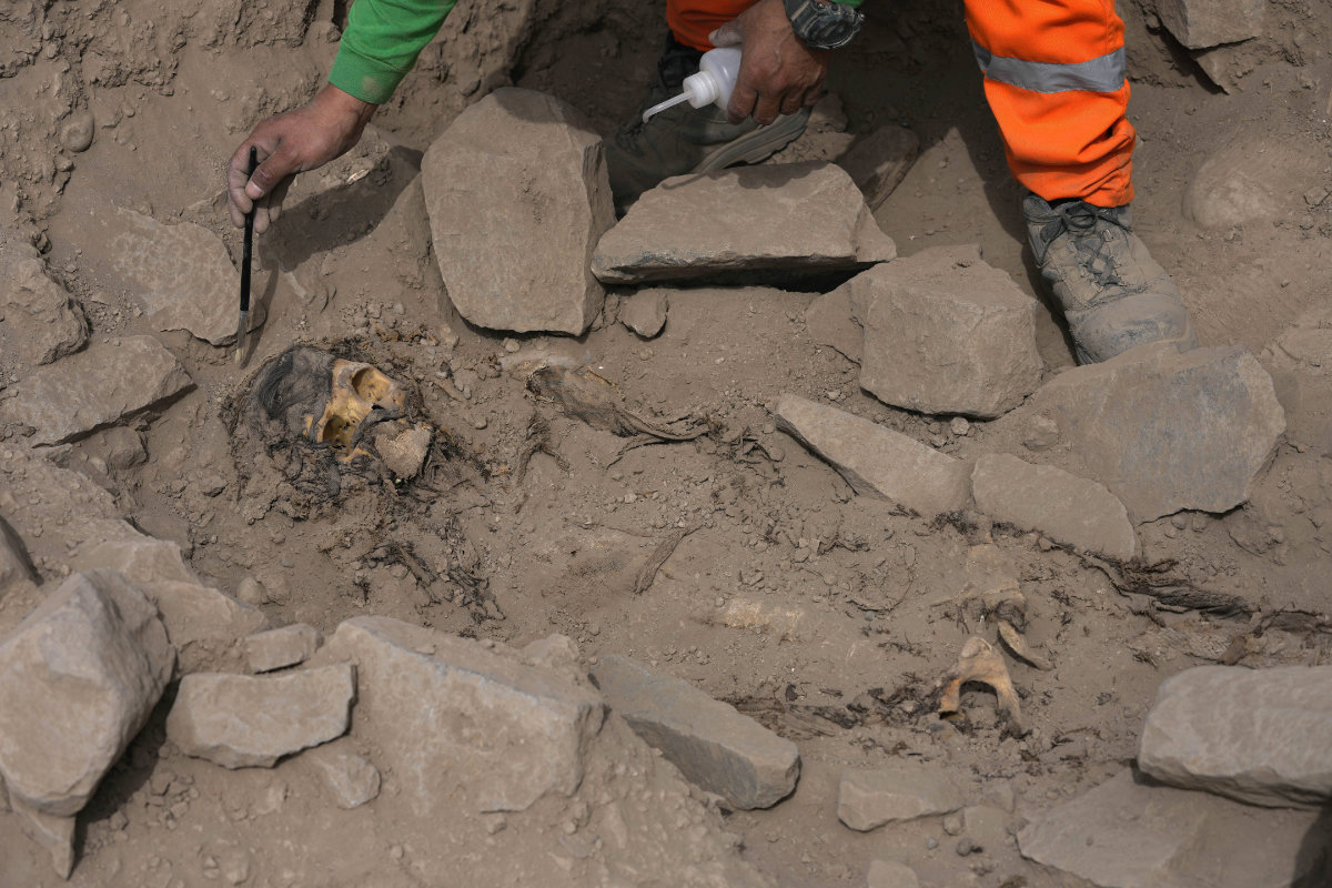 Archaeologists find mummy surrounded by coca leaves on hilltop in Peru’s capital