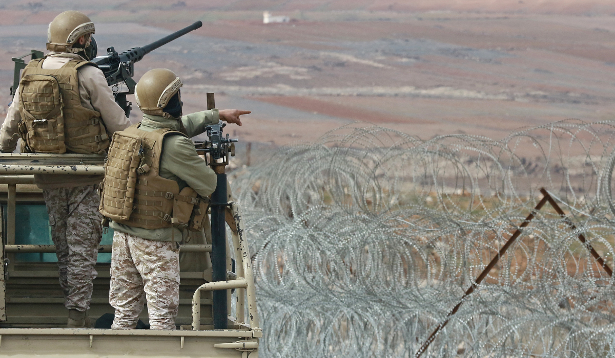A picture taken during a tour organized by the Jordanian Army shows soldiers patrolling along the border with Syria to prevent trafficking, on February 17, 2022. (AFP)