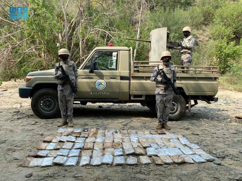 Saudi Border Guard troopers display the packs of qat they have confiscated from smugglers along the Kingdom's southern border with Yemen. (SPA)