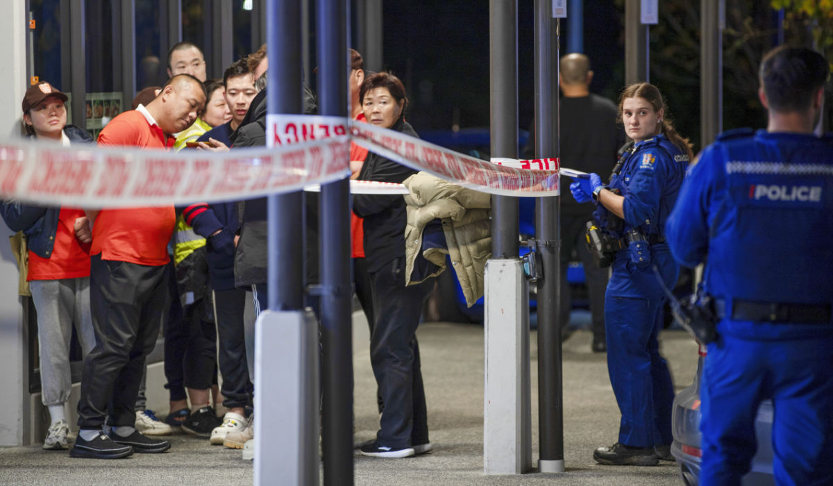 Police tape cordons off a restaurant in Auckland, New Zealand, Tuesday, June 20, 2023, after an axe attack late Monday. (AP)