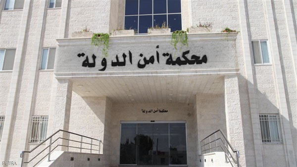 Nine suspects, who are accused of killing four Jordanian police officers during riots outside Amman in December 2022, stood trial on Tuesday before the State Security Court. (Petra)