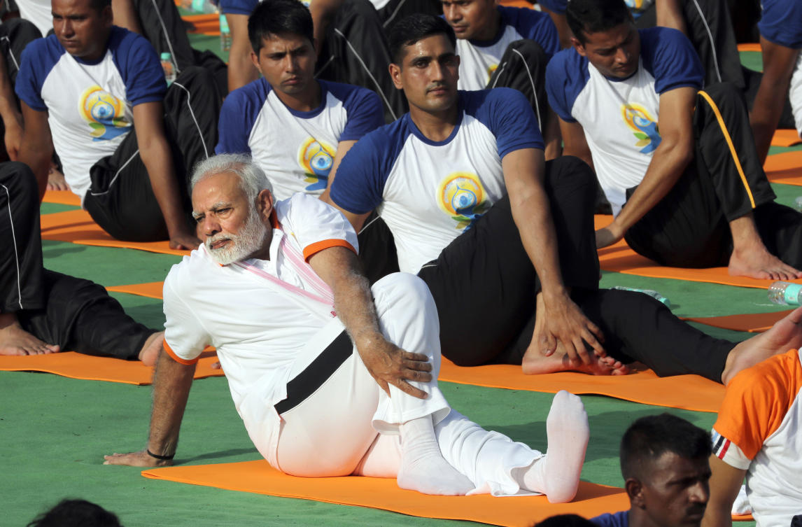 India’s PM Narendra Modi, known for his reputation of an ascetic, is participating in a yoga session at the UN during his three-day visit to the United States. (AP/File)