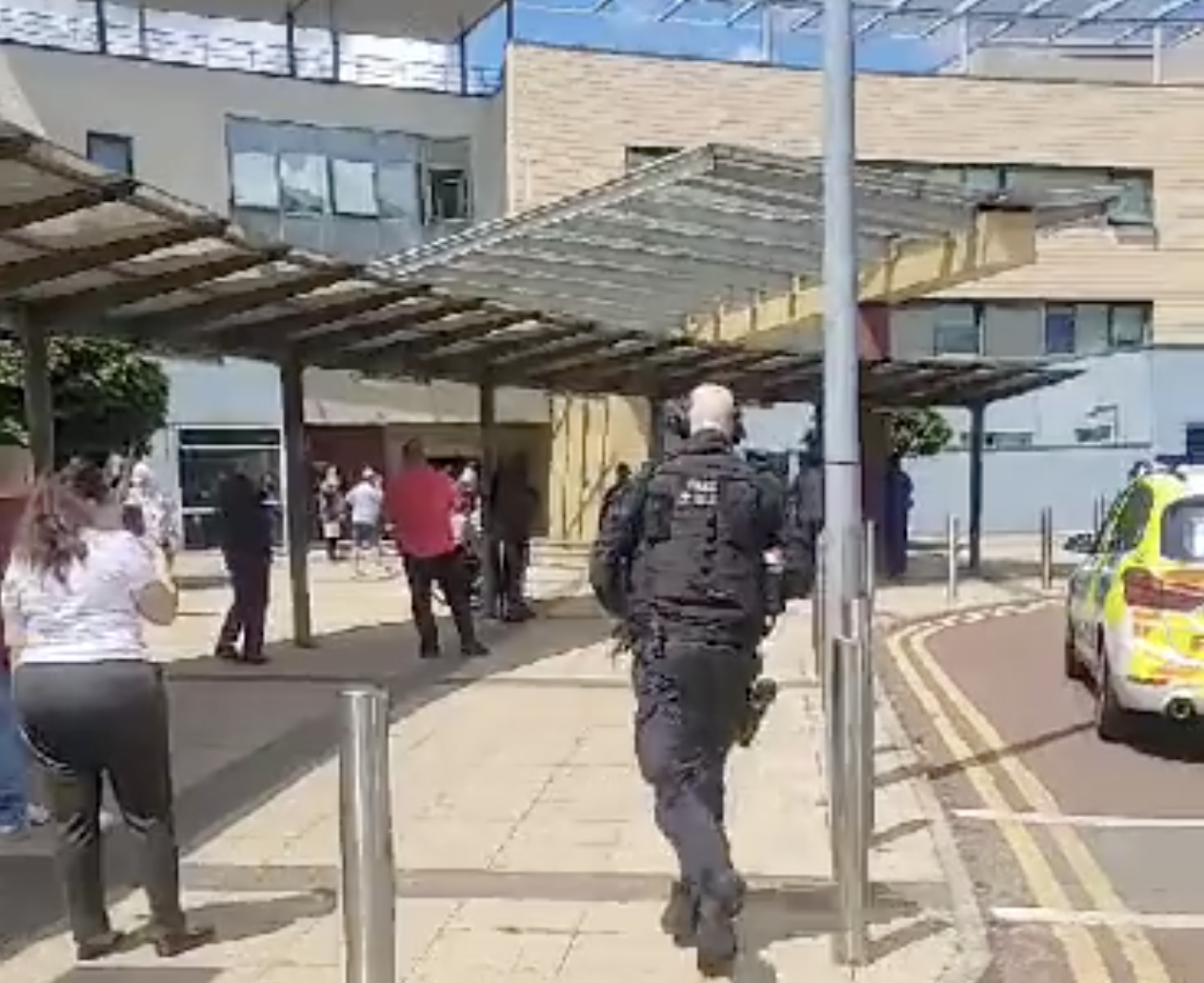 Armed police responding to an incident at Central Middlesex Hospital in west London. (Screengrab)
