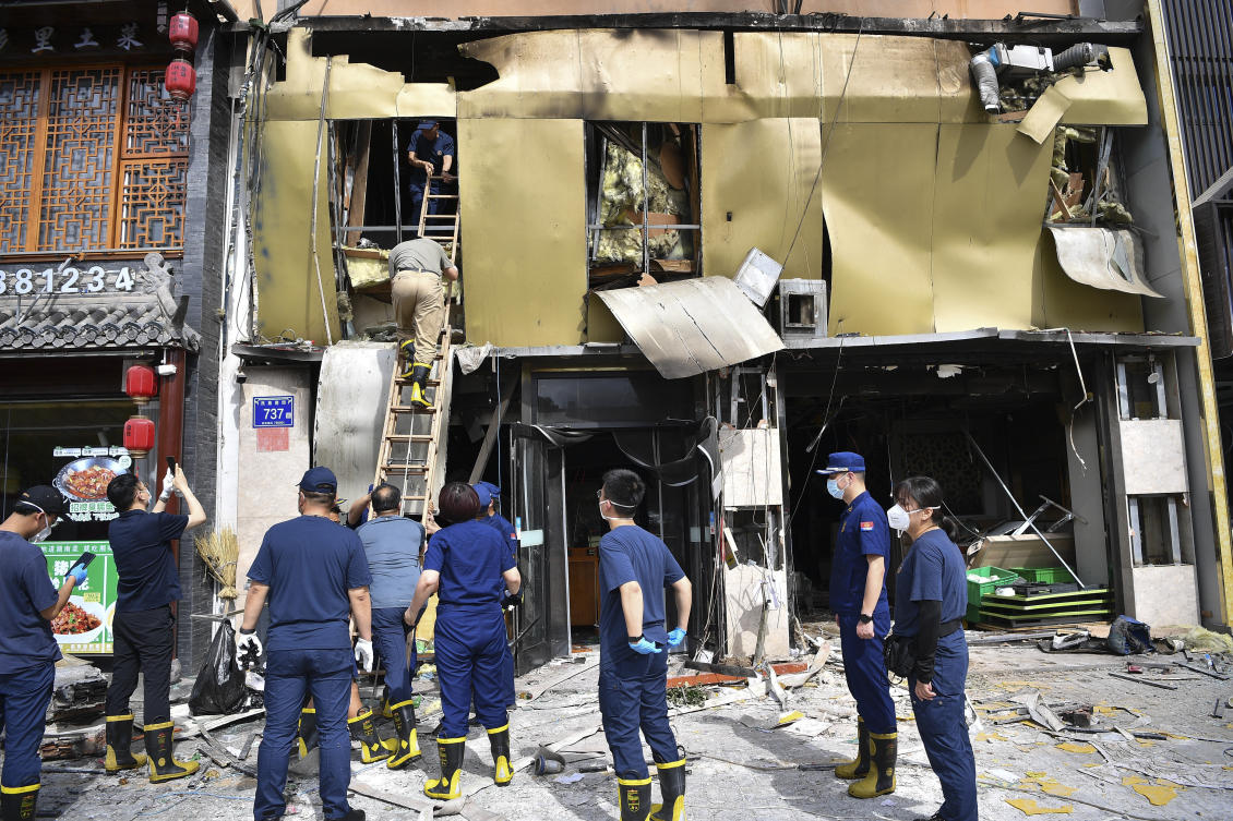 Members of China’s Ministry of Emergency Management conduct an inspection at the site of an explosion at a restaurant in Yinchuan, northwest China’s Ningxia Hui Autonomous Region on June 22, 2023. (Xinhua via AP)