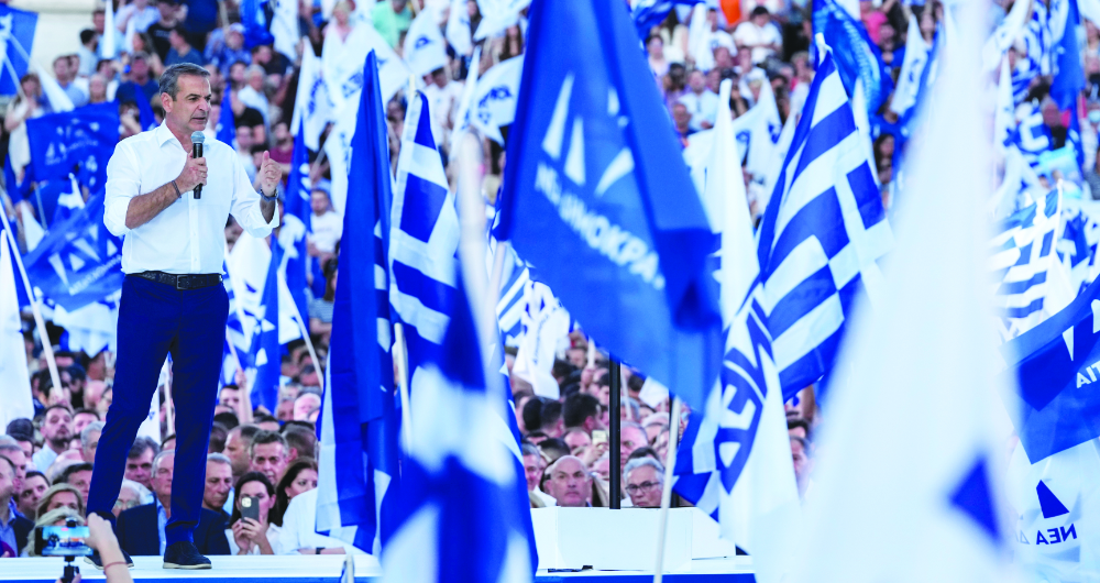 New Democracy leader Kyriakos Mitsotakis speaks during his main election campaign rally for the country’s second general elections, in Athens on Friday. (AP)