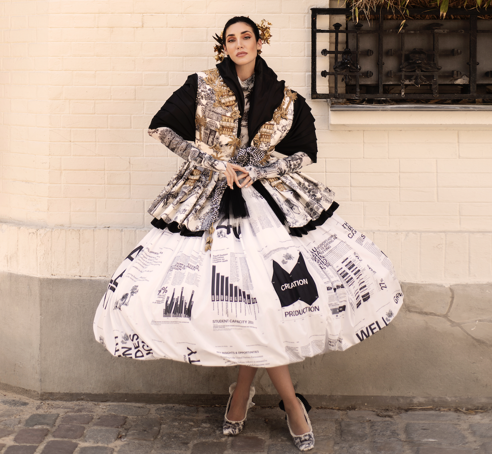 The report was unveiled in the form of a book woven into a dress by Saudi label Atelier Hekayat. (Supplied)