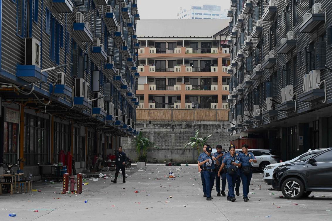 Chinese, Vietnamese, Singaporean and Malaysian nationals were among those found when police raided buildings inside a compound in the capital on Monday night. (AFP)