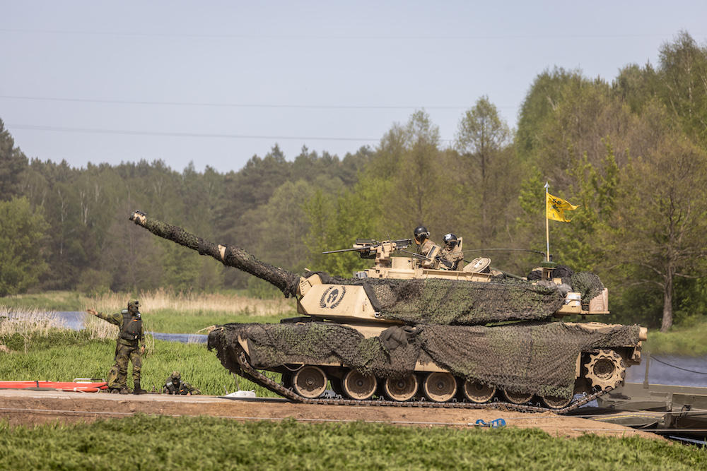 Above, a US Abrams tank during the DEFENDER-Europe 22 military exercise in Nowogrod, Poland on May 19, 2022. The Abrams shipment to Poland is part of a deal worth $1.4 billion for 116 M1A1 Abrams tanks that were previously used by the US Marine Corps. (AFP)