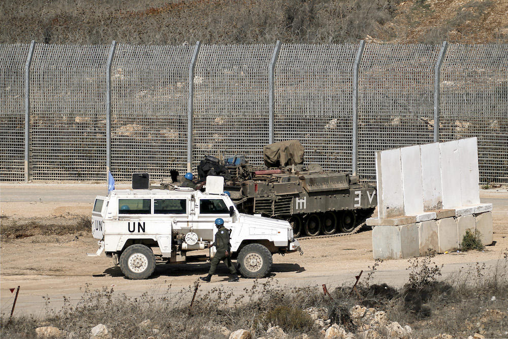 Above, Fijian peacekeepers belonging to the United Nations Disengagement Observer Force at the Israeli-occupied Golan Heights. (AFP file photo)