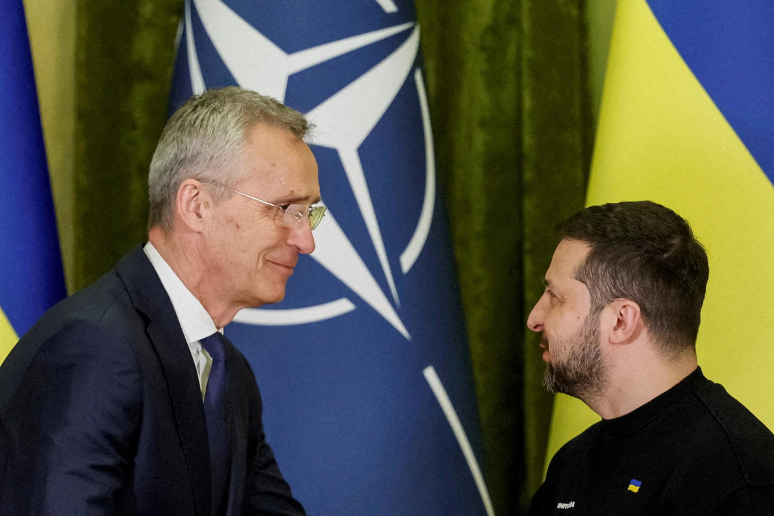Above, NATO secretary general Jens Stoltenberg with Ukrainian president Volodymyr Zelensky during an earlier meeting. Stoltenberg says all bloc members agree to stick by a 2008 pledge that Ukraine will become a member at some undefined point. (Reuters)