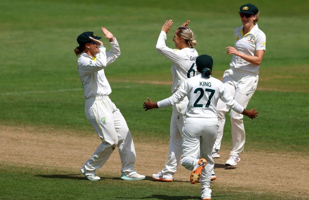 Australia’s Ashleigh Gardner celebrates with teammates after taking the wicket of England’s Danni Wyatt at Trent Bridge, Nottingham, Britain, June 26, 2023. (Reuters)