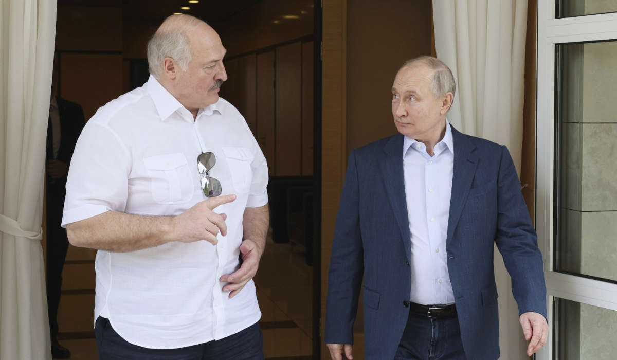Russian President Vladimir Putin, left, and Belarusian President Alexander Lukashenko speak during their meeting at the Bocharov Ruchei residence in the resort city of Sochi, Russia, Friday, June 9, 2023. (AP)