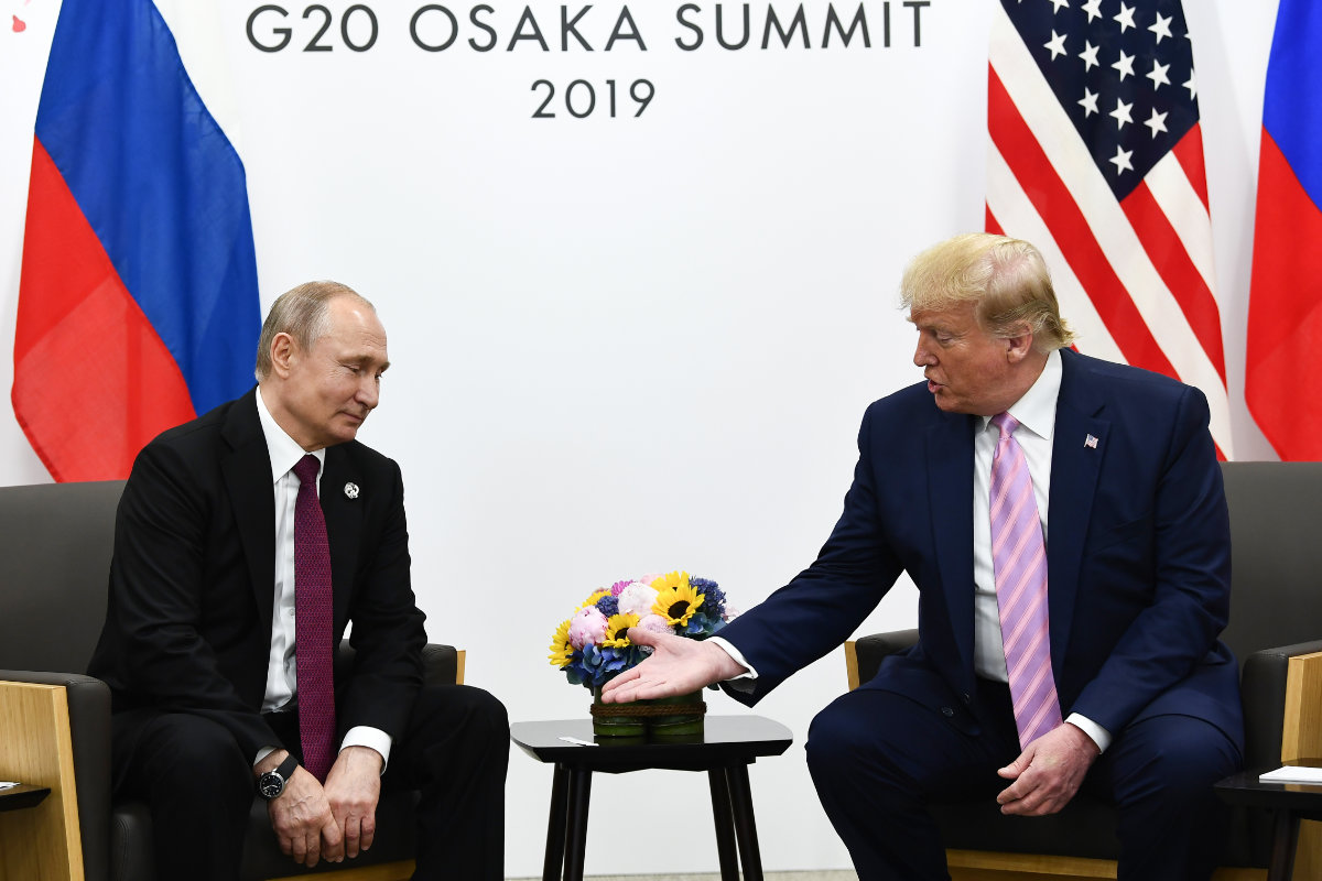 US President Donald Trump (R) attends a meeting with Russia's President Vladimir Putin during the G20 summit in Osaka on June 28, 2019. (AFP)
