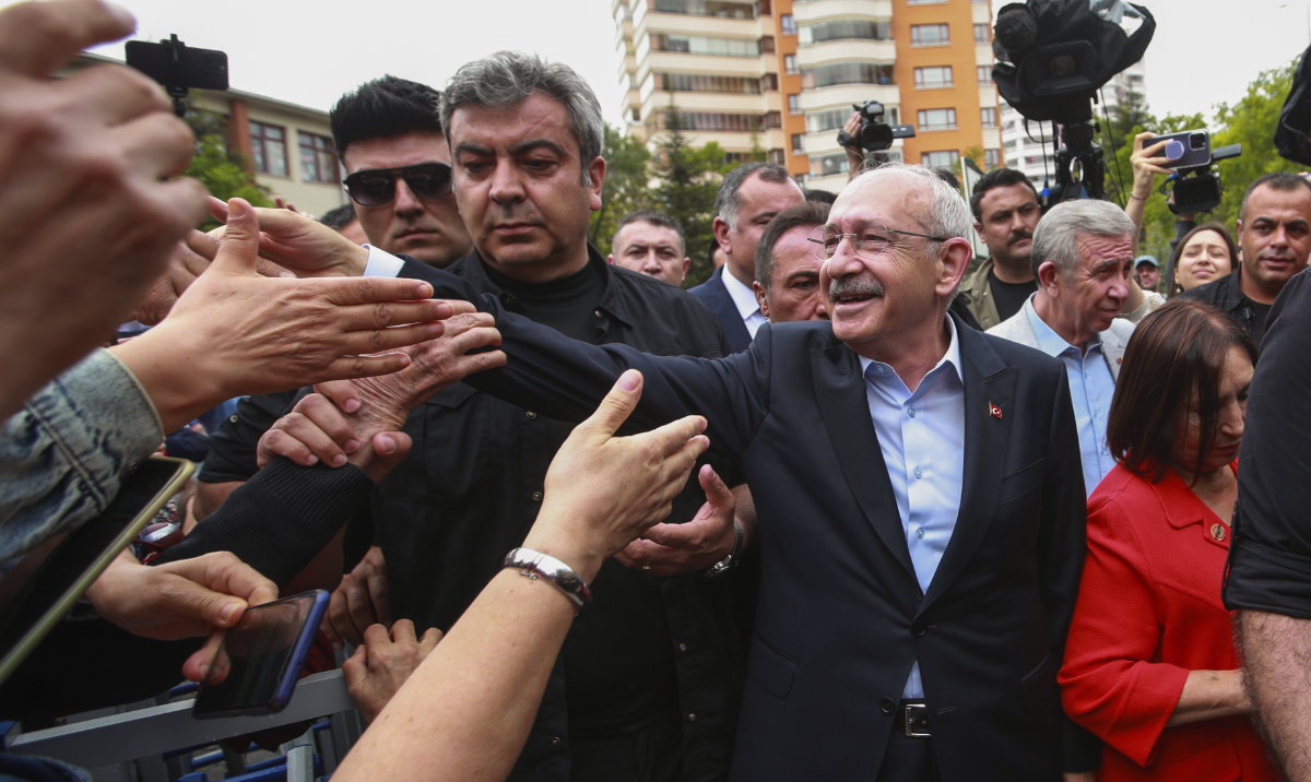 Supporters surround Turkey’s main opposition Republican People’s Party leader Kemal Kilicdaroglu, right, in Ankara. (AP)