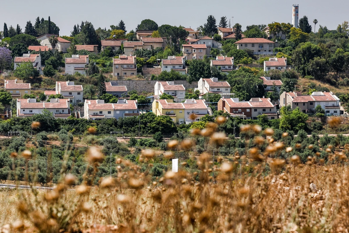 By the end of 2022, the West Bank had about 199 settlements and 220 outposts, housing more than 600,000 settlers (File/AFP)
