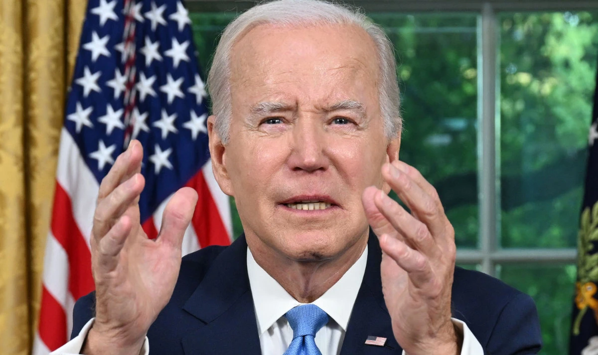 US President Joe Biden addresses the nation on averting default and the Bipartisan Budget Agreement, in the Oval Office of the White House in Washington, DC, June 2, 2023. (AFP)