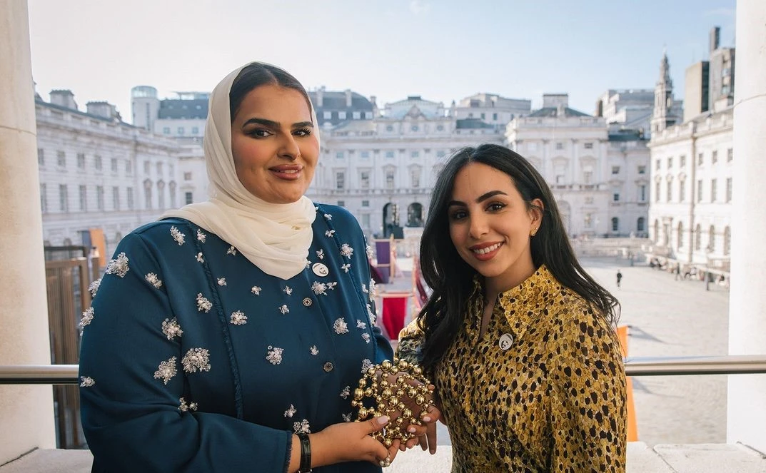 Salama Al Shamsi, left, and Azza Alsharif accept the award in London. (Instagram)