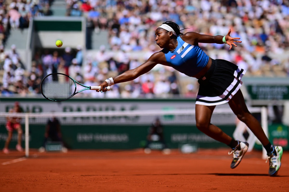 US Coco Gauff of the US returns the ball to Russia's Mirra Andreeva during their women's singles match on day seven of the Roland-Garros Open tennis tournament at the Court Suzanne-Lenglen in Paris on Saturday. (AFP)