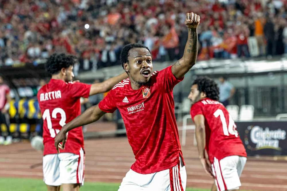 Al-Ahly’s South African forward Percy Tau (C) reacts during the first-leg final football match of the CAF Champions League, between Egypt's Al-Ahly and Morocco's Wydad AC, at Cairo International Stadium on June 4, 2023. (AFP)