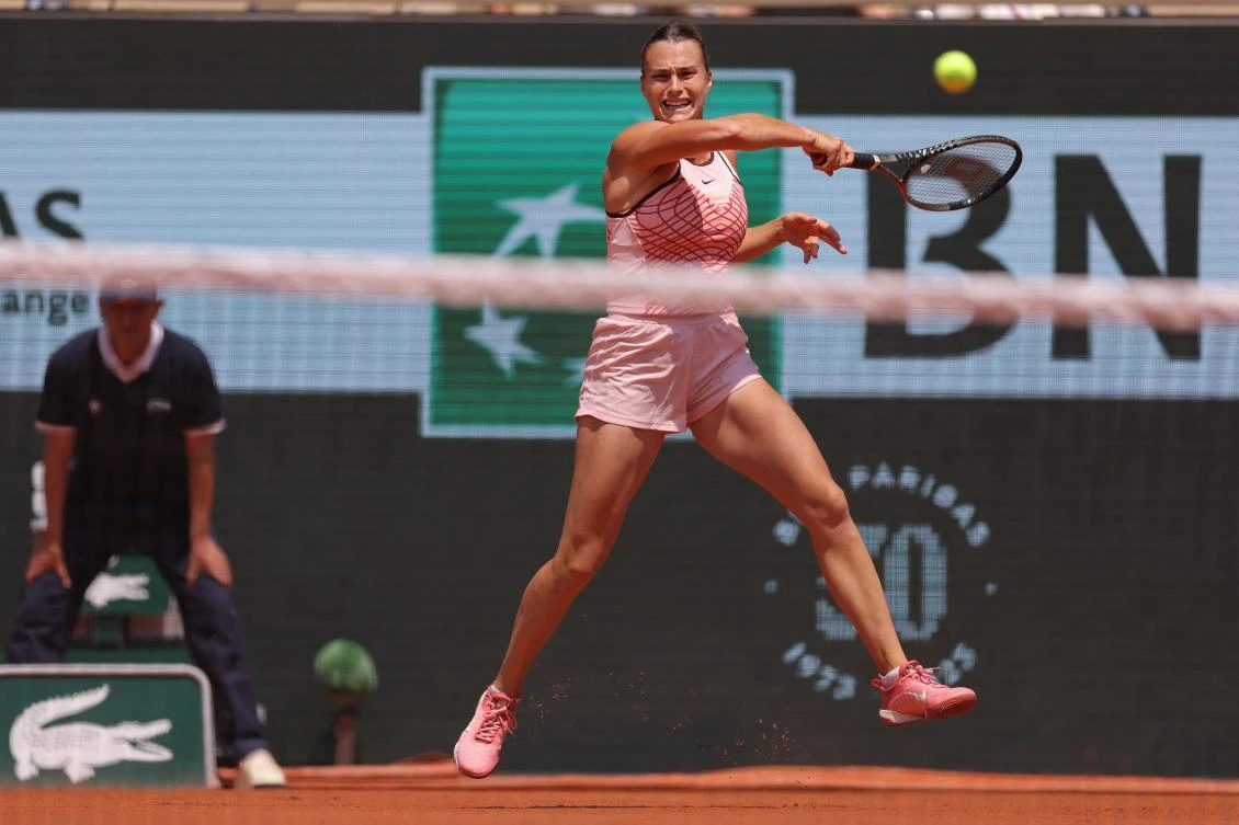 Belarus’ Aryna Sabalenka plays a forehand return to Ukraine’s Elina Svitolina during their women’s singles quarter final match on day ten of the Roland-Garros Open tennis tournament at the Court Philippe-Chatrier in Paris on Jun. 6, 2023. (AFP)