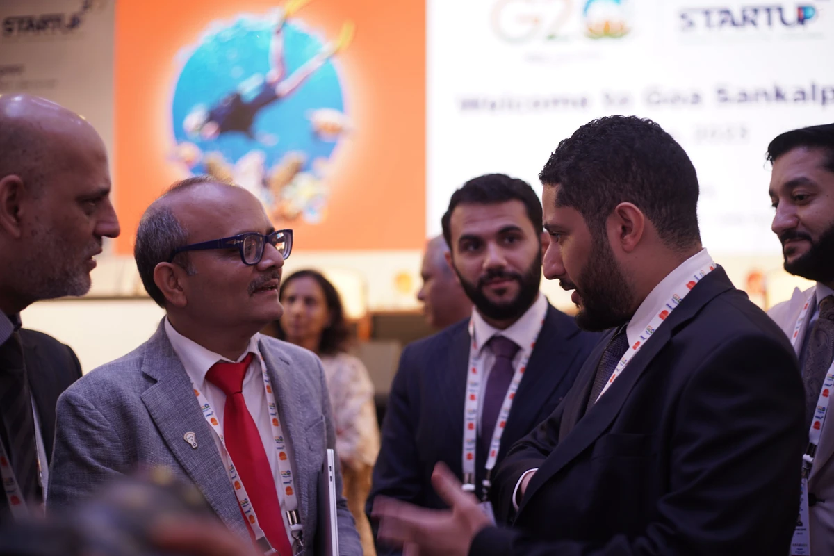Startup20 chair Dr. Chintan Vaishnav, left, welcomes Prince Fahad bin Mansour Al-Saud during the G20 engagement group’s summit in Goa, India, on June 4, 2023. (Startup20)