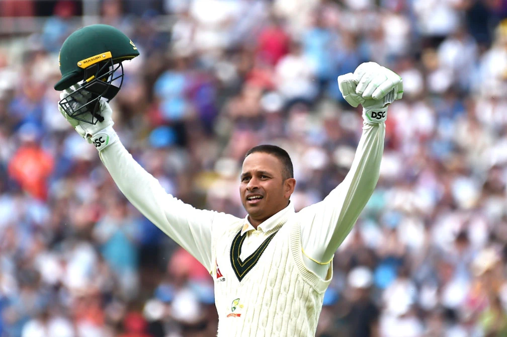 Australia's Usman Khawaja celebrates making 100 runs during Day 2 of the first Ashes Test cricket match between England and Australia at Edgbaston, Birmingham, England, Saturday. (AP)