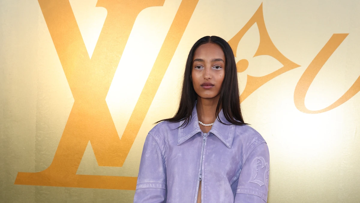 The model — who is of Turkish, Somali and Ethiopian descent — wore an oversized purple set. (Getty Images)