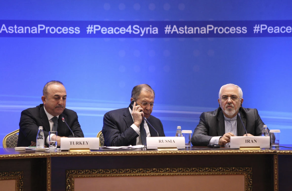 FMs, Sergei Lavrov, center, of Russia, Mevlut Cavusoglu, left, of Turkiye and Mohammad Javad Zarif of Iran, attend the International Meeting on Syria, Astana, Kazakhstan, Mar. 16, 2018. (Reuters)