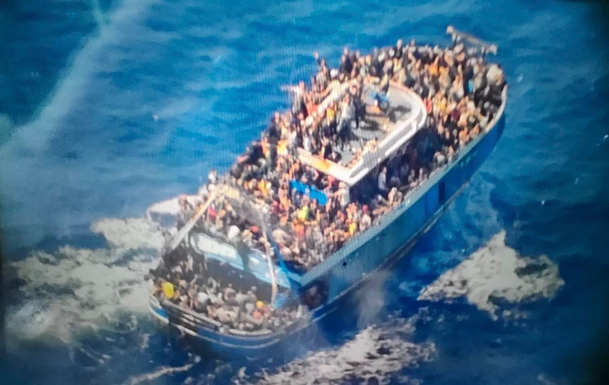 This undated handout image provided by Greece's coast guard on June 14, 2023, shows scores of people on a battered fishing boat that later capsized and sank off southern Greece. (Hellenic Coast Guard via AP, File)