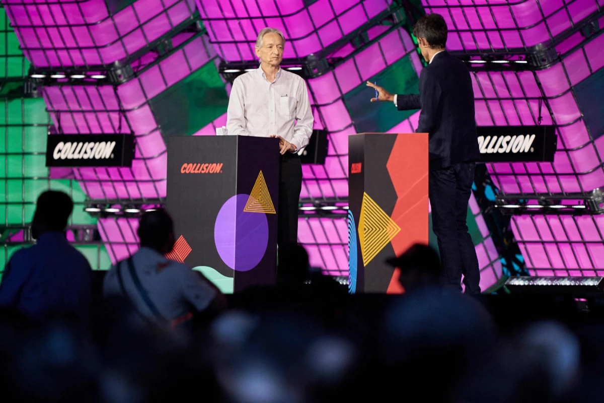 British-Canadian cognitive psychologist and computer scientist Geoffrey Hinton, known as the 'godfather of AI' speaks with technology journalist and CEO of The Atlantic Nick Thompson (R) during the Collision Tech Conference in Toronto, Canada, on June 28, 2023. (AFP)