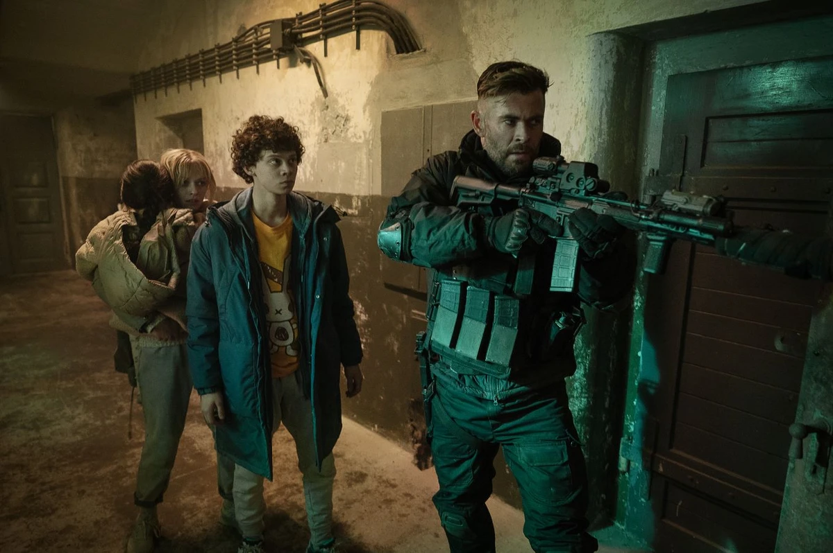 Extraction 2 - Chris Hemsworth as Tyler Rake (Producer), Tinatin Dalakishvili as Ketevan, Andro Jafaridze as Sandro in ‘Extraction 2.’ (Netflix)