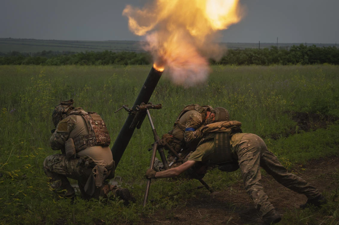 Ukrainian soldiers fire toward Russian position on the frontline in Zaporizhzhia region in Ukraine on June 24, 2023. (AP)