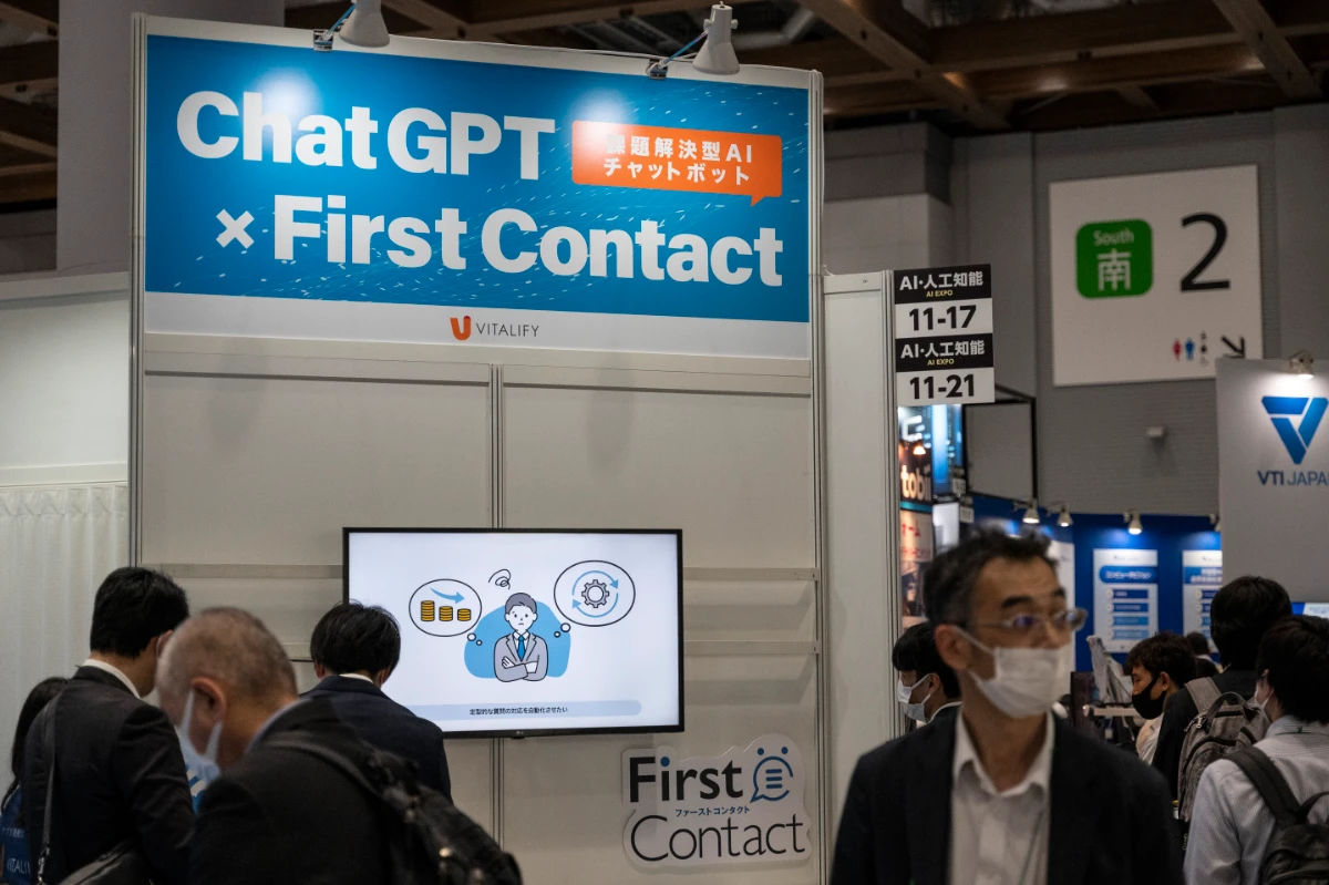 "FirstContact", a problem-solving AI-equipped chatbot service using ChatGPT, is featured during in Tokyo's 7th AI Expo. (AFP)