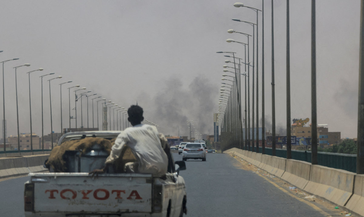 Smoke rises in Omdurman, during clashes between Paramilitary Forces and the army as seen from Khartoum North, Sudan. (Reuters)