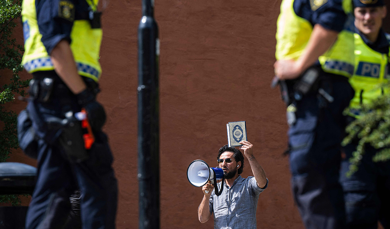 In this photo, taken on June 28, 2023, Salwan Momika protests outside a mosque in Stockholm, during the Eid al-Adha holiday. (AFP/File)