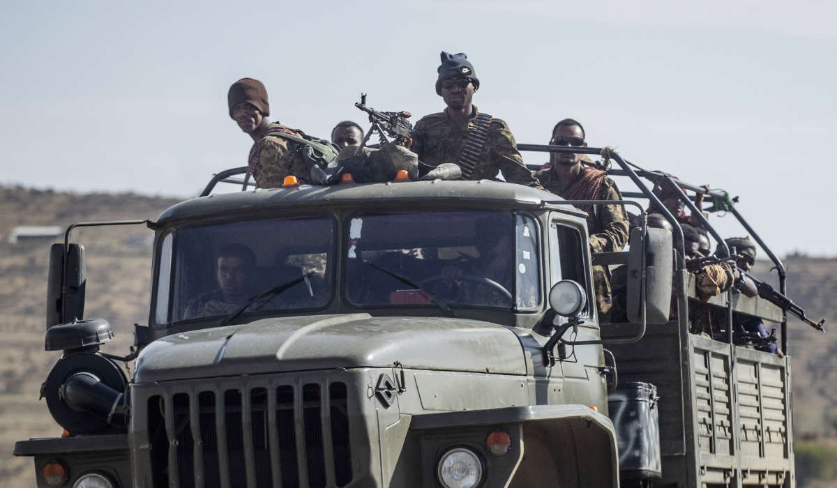 In this Saturday, May 8, 2021 file photo, Ethiopian government soldiers ride in the back of a truck on a road near Agula, north of Mekele, in the Tigray region of northern Ethiopia. (AP)