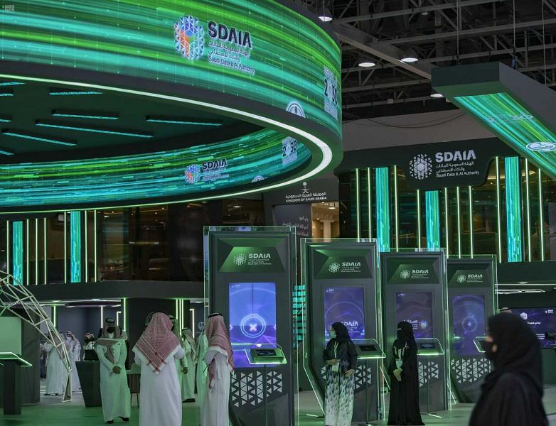 Saudi Data and Artificial Intelligence Authority takes part in an exhibition. (File/SPA)
