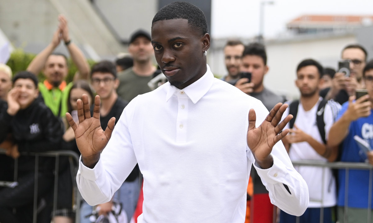 US soccer player Timothy Weah waves as he arrives for fitness tests at the Italian soccer club Juventus F.C. in Turin, Italy, Thursday. (AP)