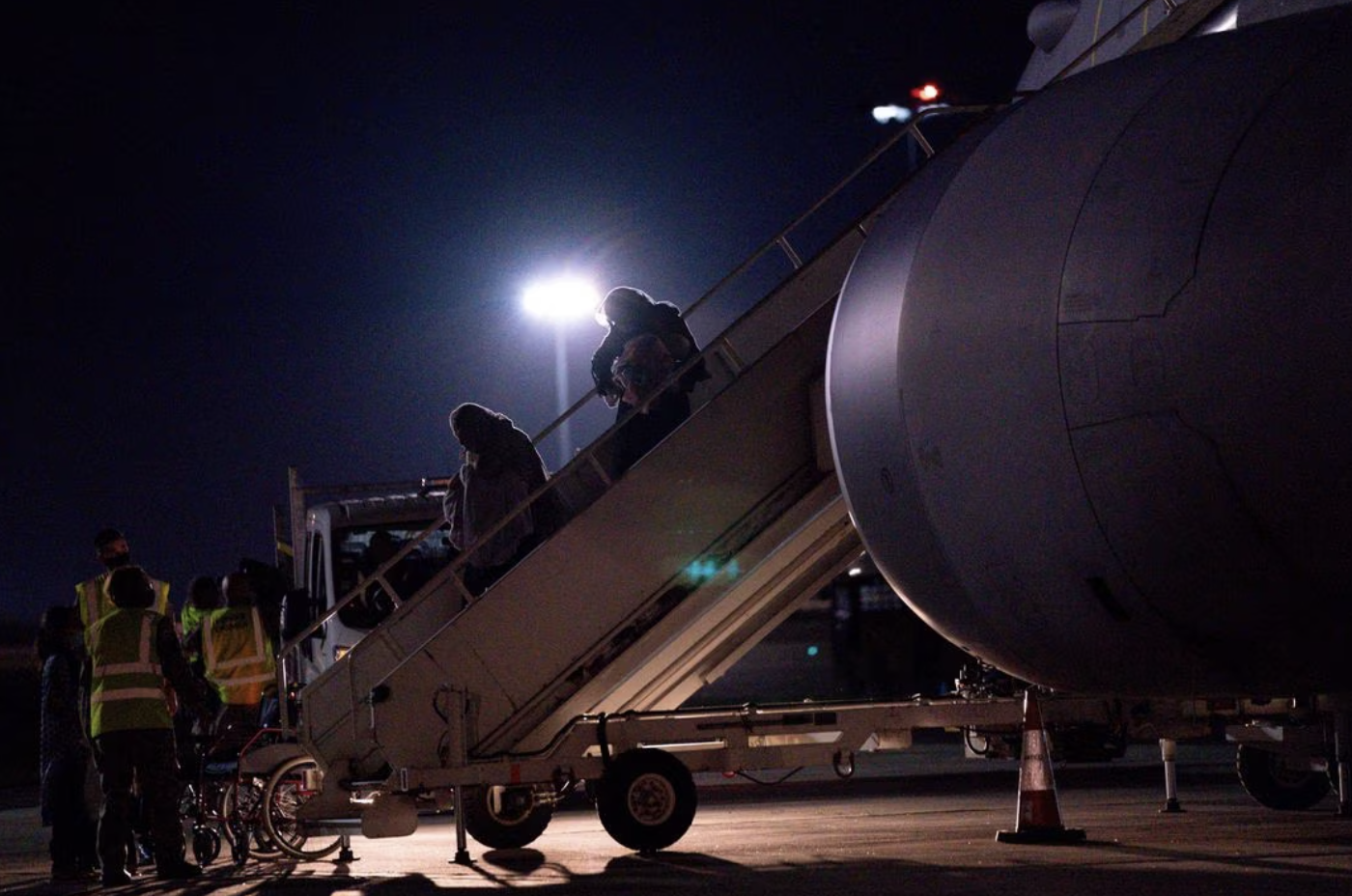 British nationals and Afghan evacuees depart a flight from Afghanistan at RAF Brize Norton, Britain August 26, 2021. (Reuters)