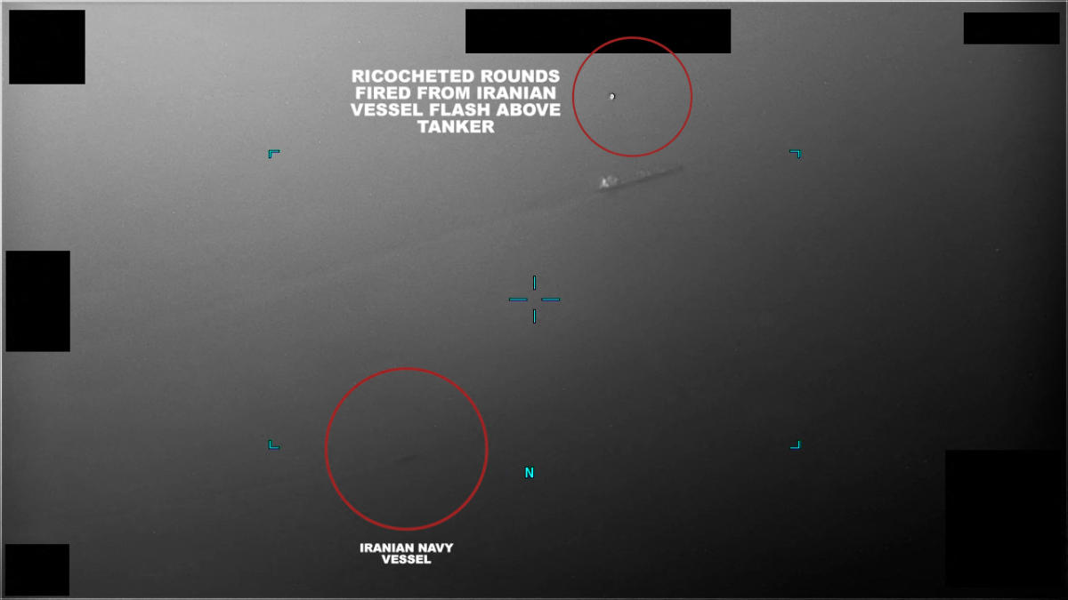 Above, a frame grab shows an Iranian naval vessel firing multiple long bursts of rounds from weapons during an attempt to seize the Bahamian-flagged Richmond Voyager off Oman. (US Department of Defense/AFP)
