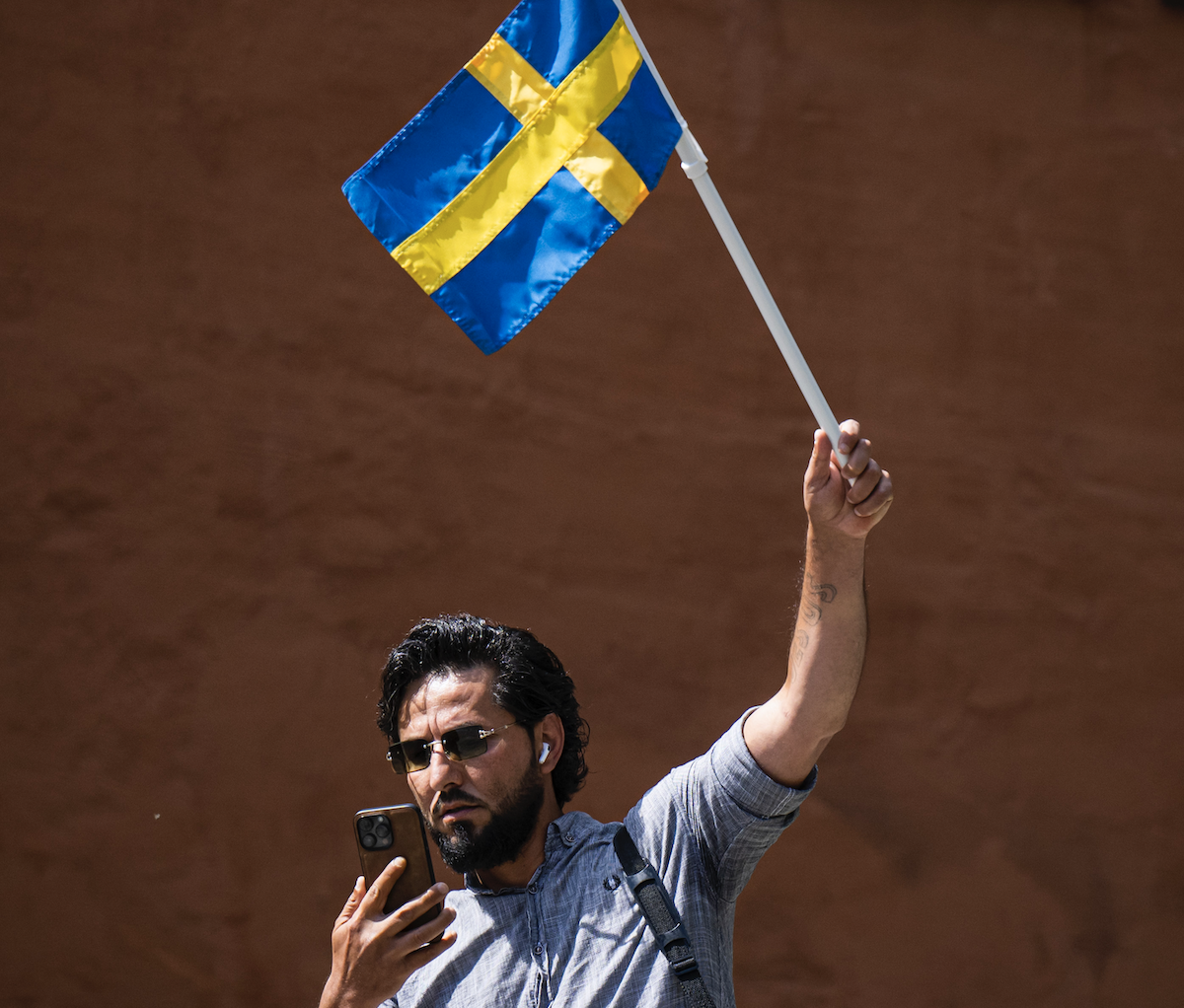 Salwan Momika protests outside a mosque in Stockholm on June 28, 2023, during the Eid Al-Adha holiday. (AFP)
