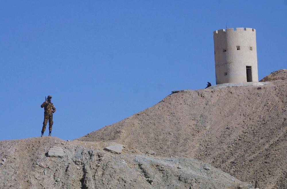 An Iranian soldier stands on the lookout of an army station in the southeastern province of Sistan-Baluchistan near the Pakistani border. (File/AFP)