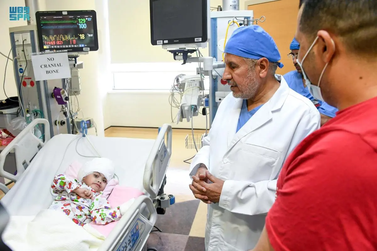 Head of KSrelief Dr. Abdullah Al-Rabeeah visited Egyptian conjoined twins ‘Salma and Sarah’ to check on their health. (SPA)