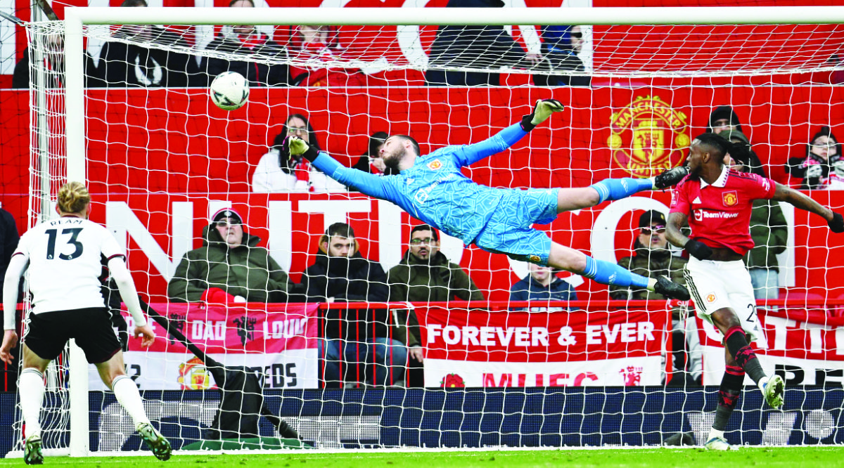 David de Gea saves a goal during a match. His contract with Man United expired at the end of June, with no new deal agreed despite talks that took place throughout the season. (AFP)