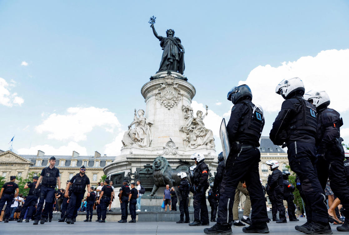Members of the BRAV-M stand in the memory of Adama Traore, a 24-year-old Black Frenchman who died in a 2016 police operation, in Paris, France, July 8, 2023. (Reuters)
