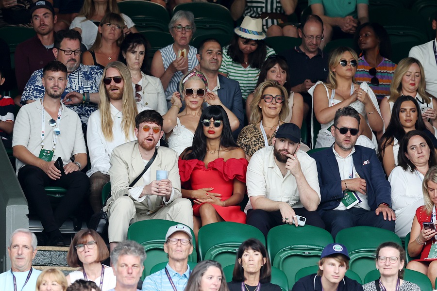 The actress attended Wimbledon in an eye-catching red outfit designed by Sarah Burton for Alexander McQueen. (Getty Images)