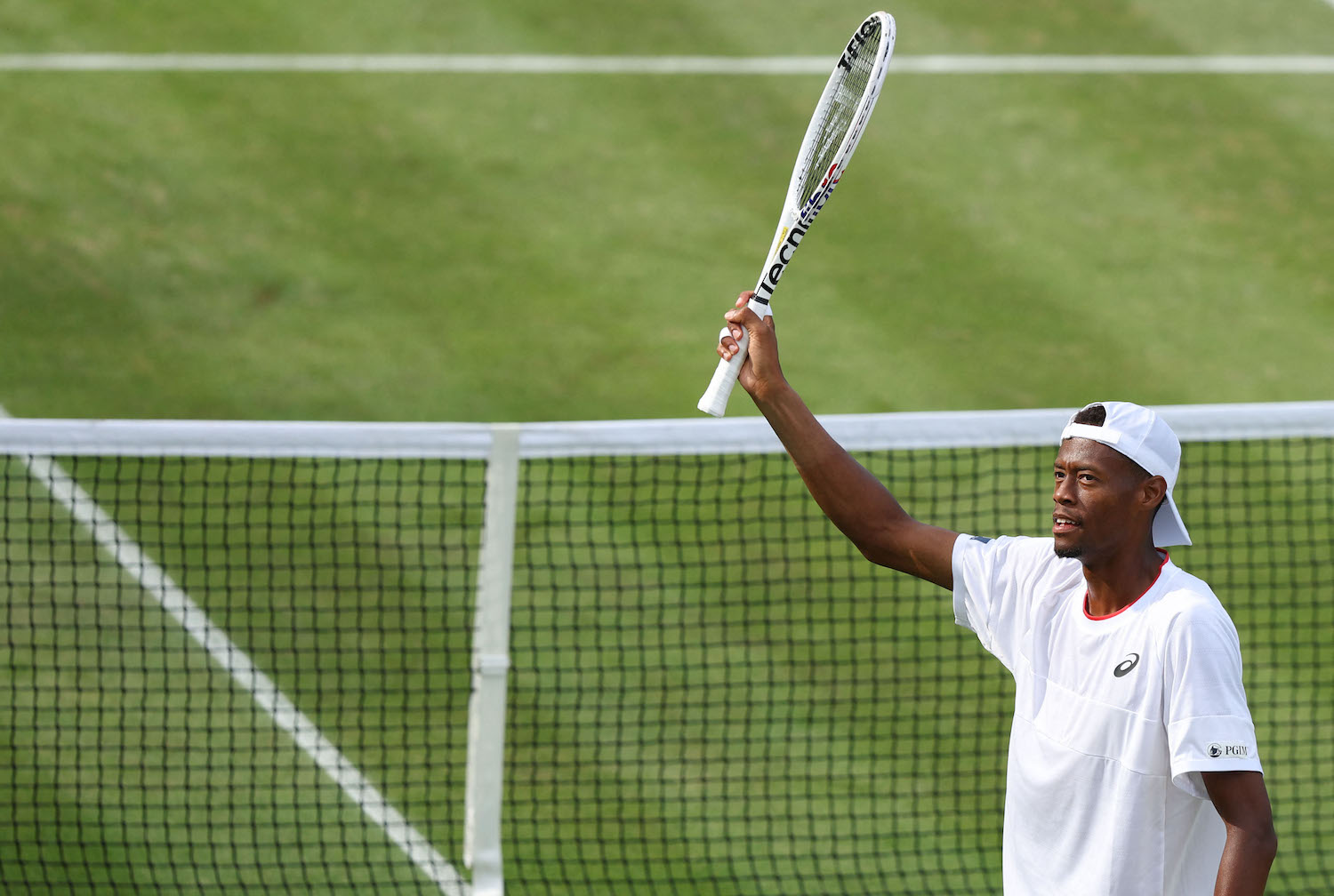 US player Christopher Eubanks celebrates beating Australia's Christopher O'Connell during their men's singles tennis match at Wimbledon, southwest London, on July 8, 2023. (AFP)