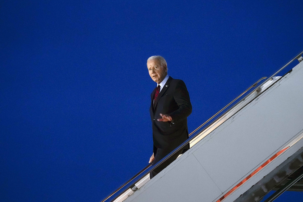 Air Force One carrying US President Joe Biden arrives at Stansted Airport in England on Sunday, as the president makes a visit to the UK on his way to a NATO summit in Lithuania. (AP)