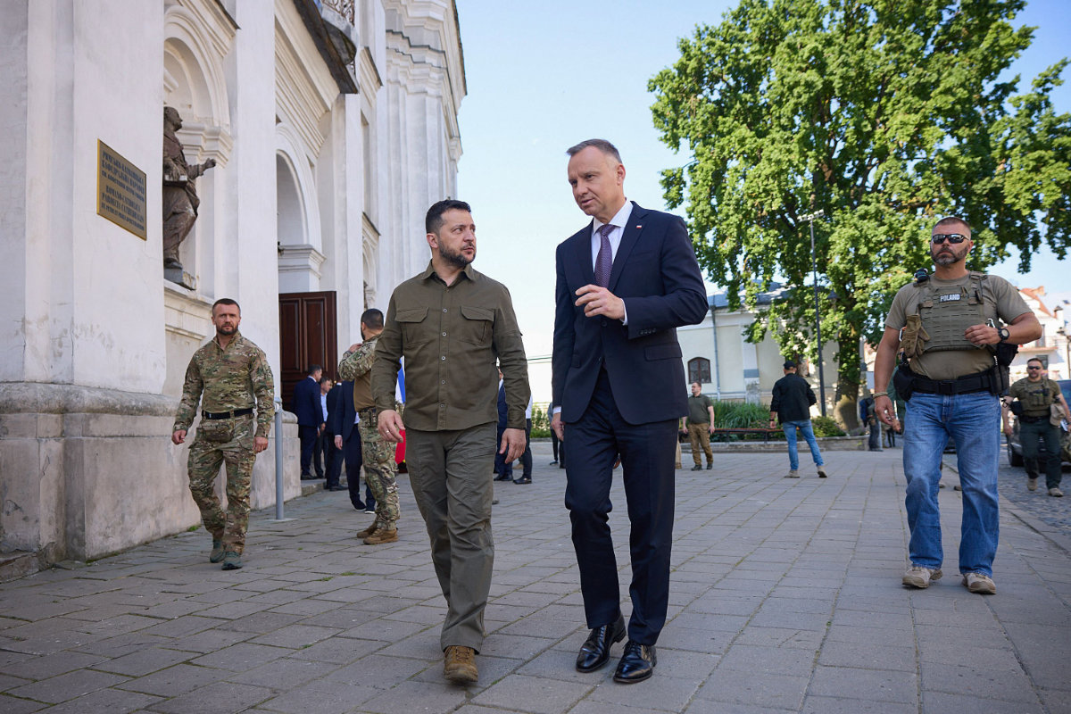 Ukraine's President Volodymyr Zelensky (L) converses with Poland's President Andrzej Duda (R) in the Polish city of Lutsk on July 9, 2023. (Ukrainian Presidential Press Service photo via AFP)