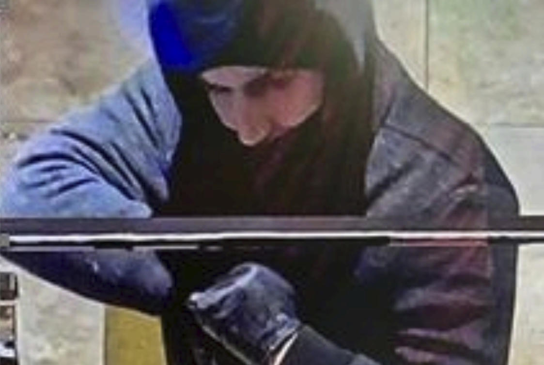 The suspect, later identified as Caleb Rogers, during a robbery at the Aliante hotel-casino in North Las Vegas on Jan. 6, 2022. (Las Vegas Metropolitan Police Department via AP)